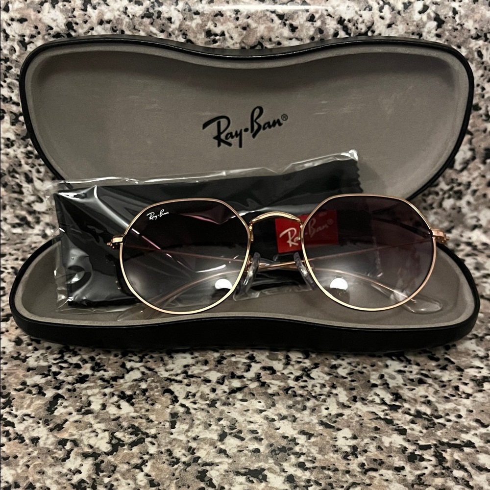 Ray-Ban Gold and Black kids sunglasses.